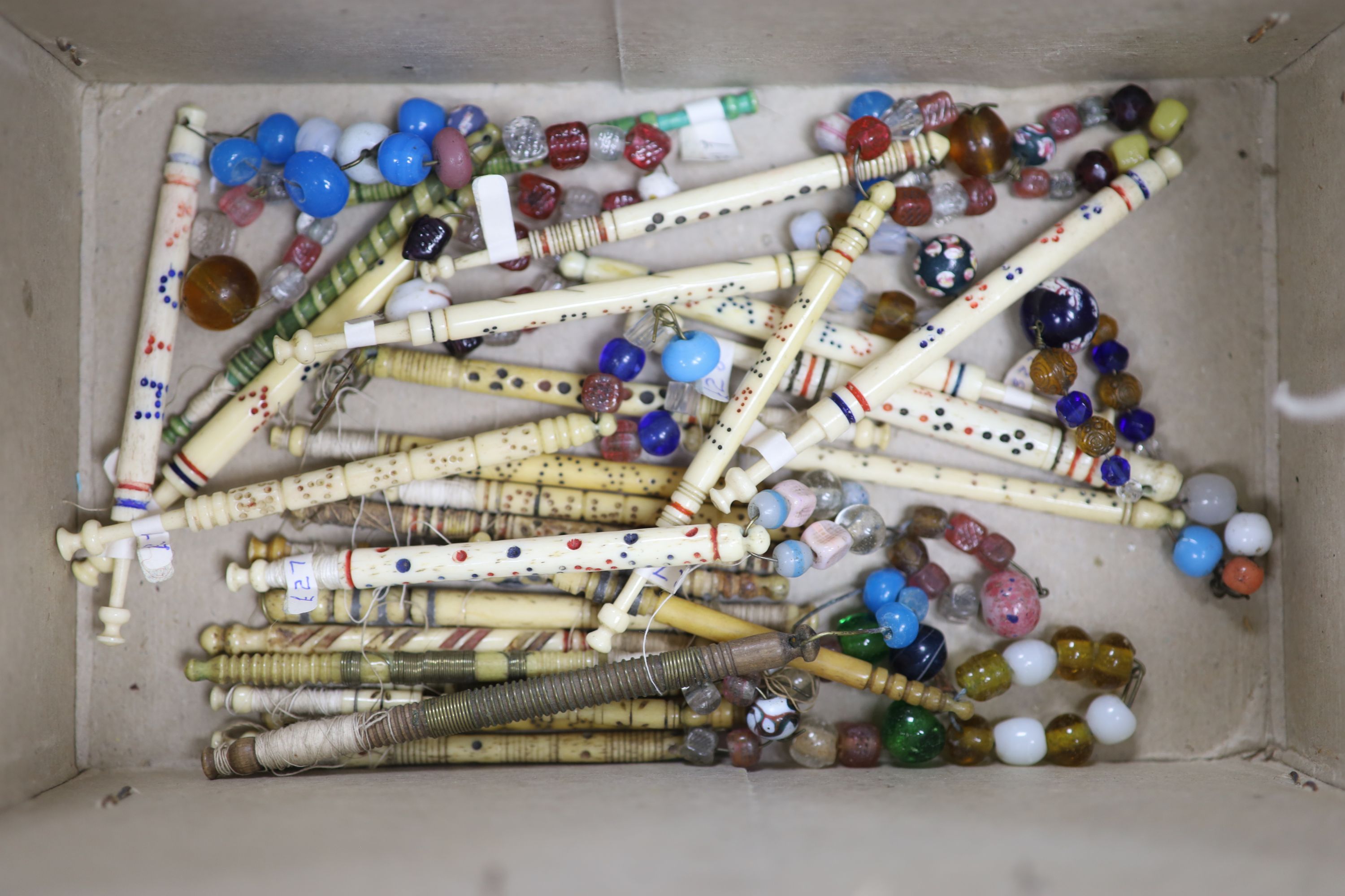 A small collection of Victorian lace-makers bone bobbins, some named